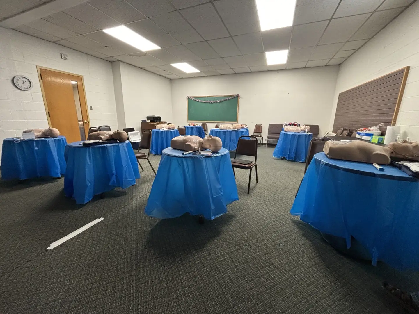 GAP training room prepared with CPR manikins and chairs